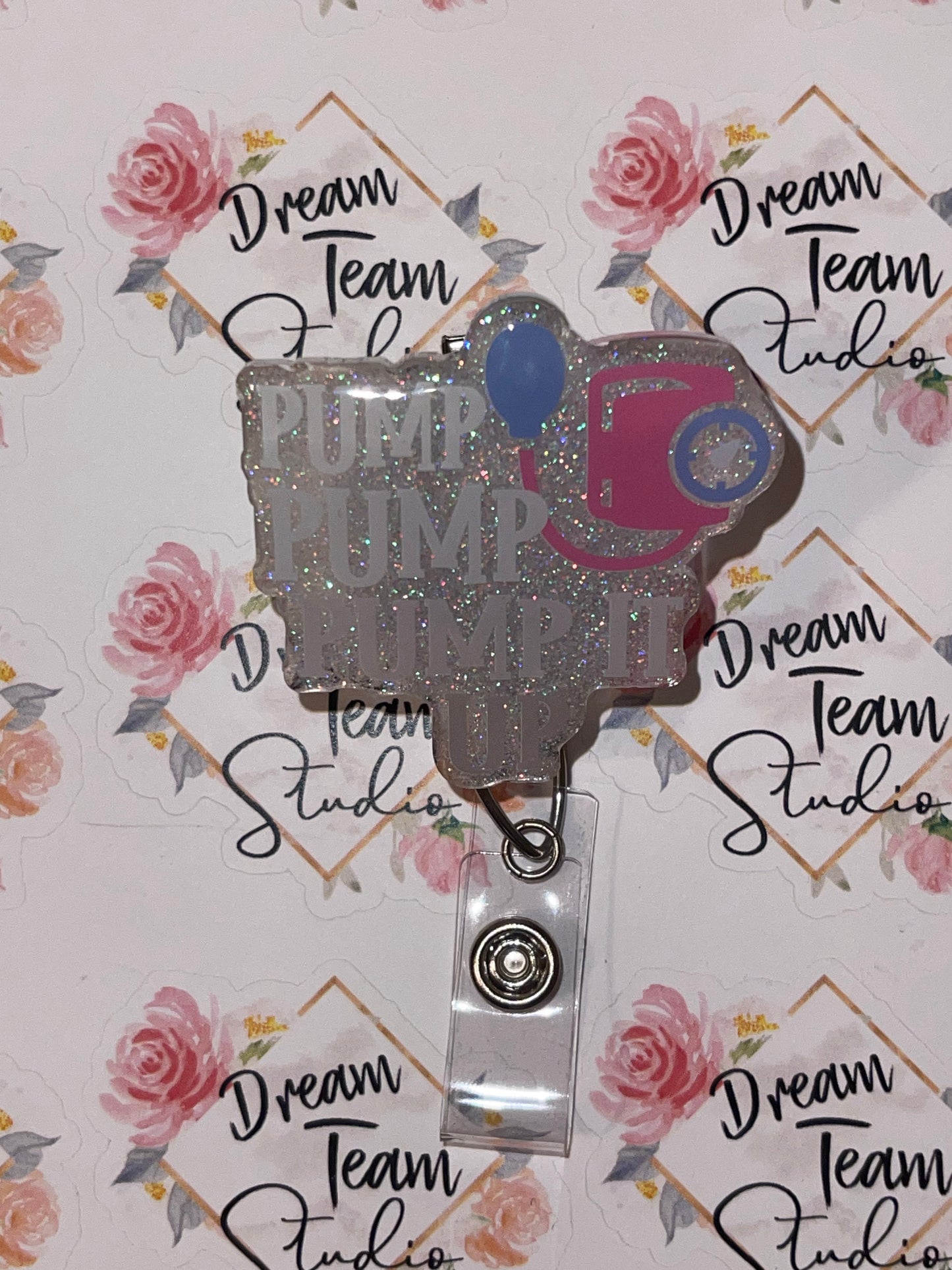 Pump It Up Badge Reel